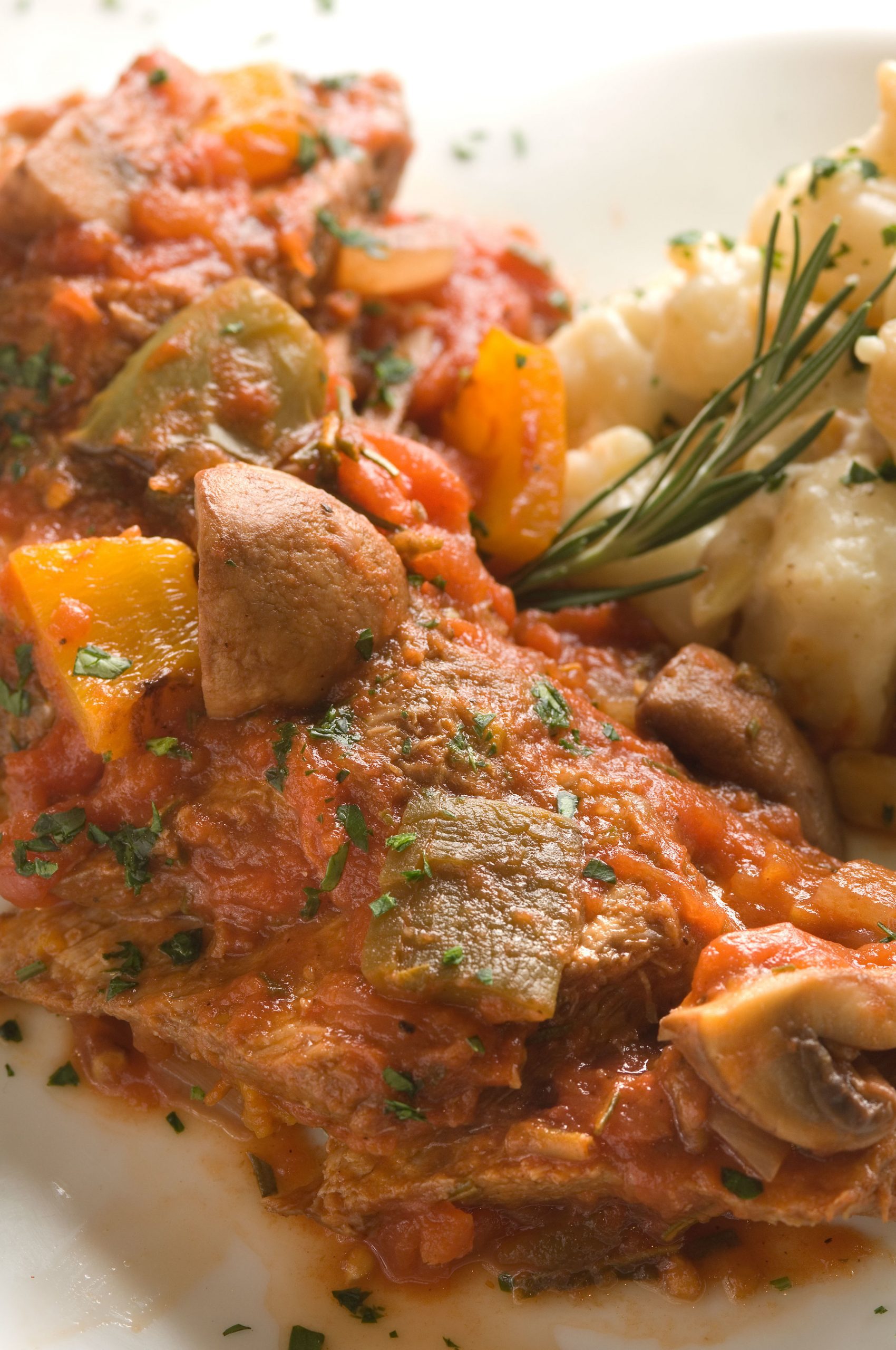 Braised Veal Cacciatore with Spicy Almond and Goat Cheese