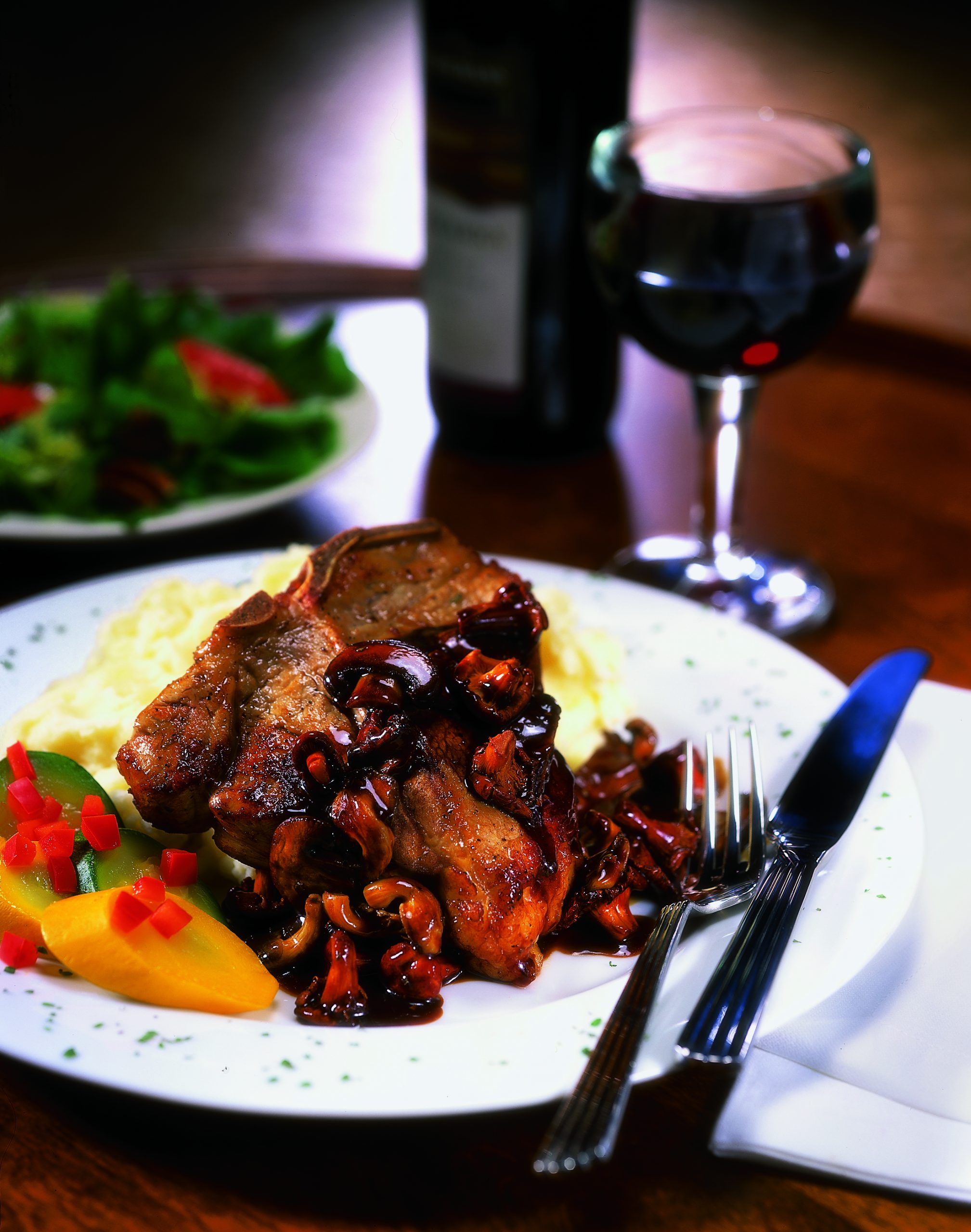 Cajun Veal Chop Smothered in Wild Mushroom Barbeque Demi-Glaze