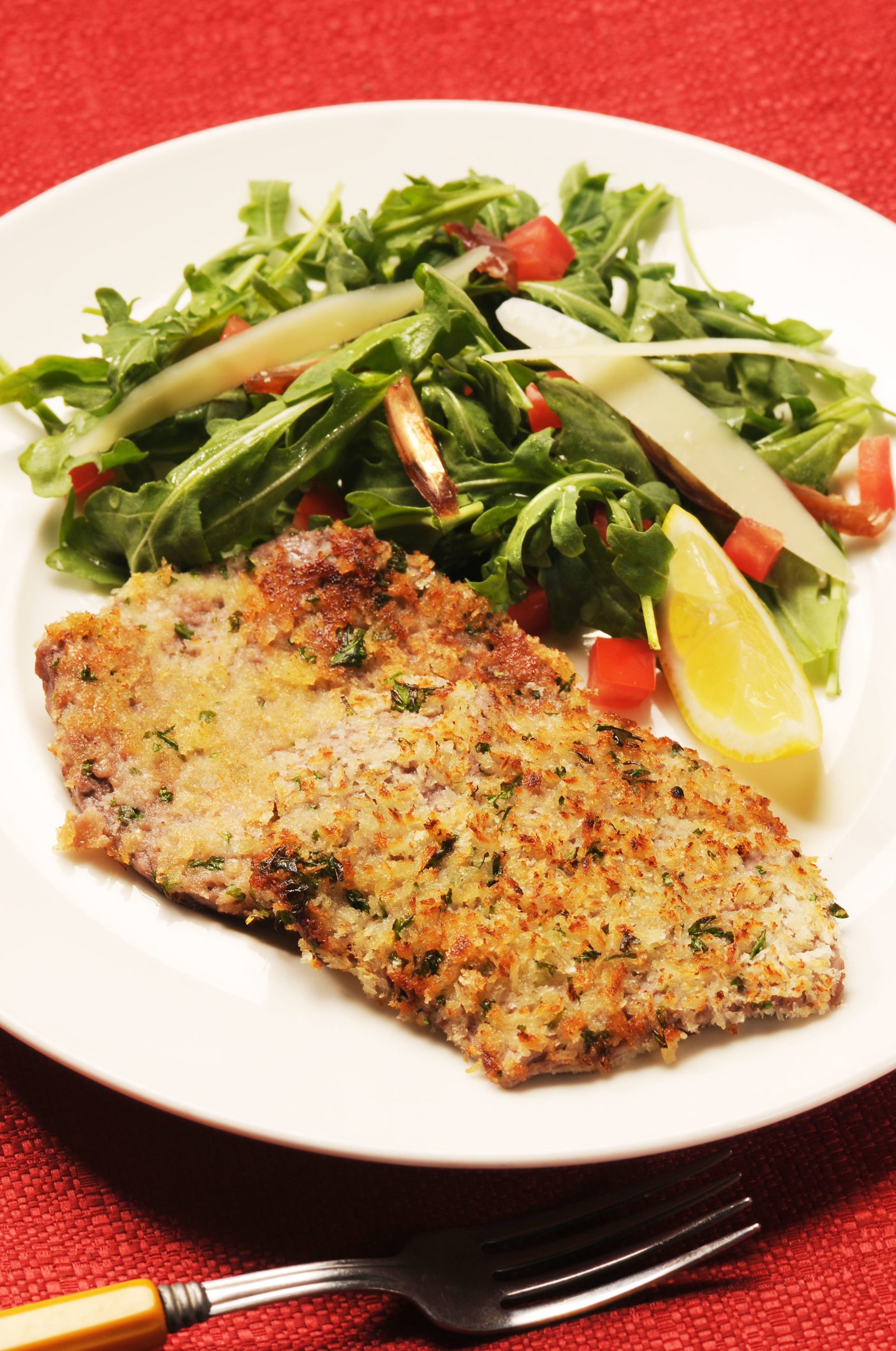 Gremolata Veal Cutlets with Arugula Salad background image