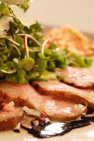 Grilled Marinated Veal Tenderloin with Micro Greens and Sartori Asiago Cheese