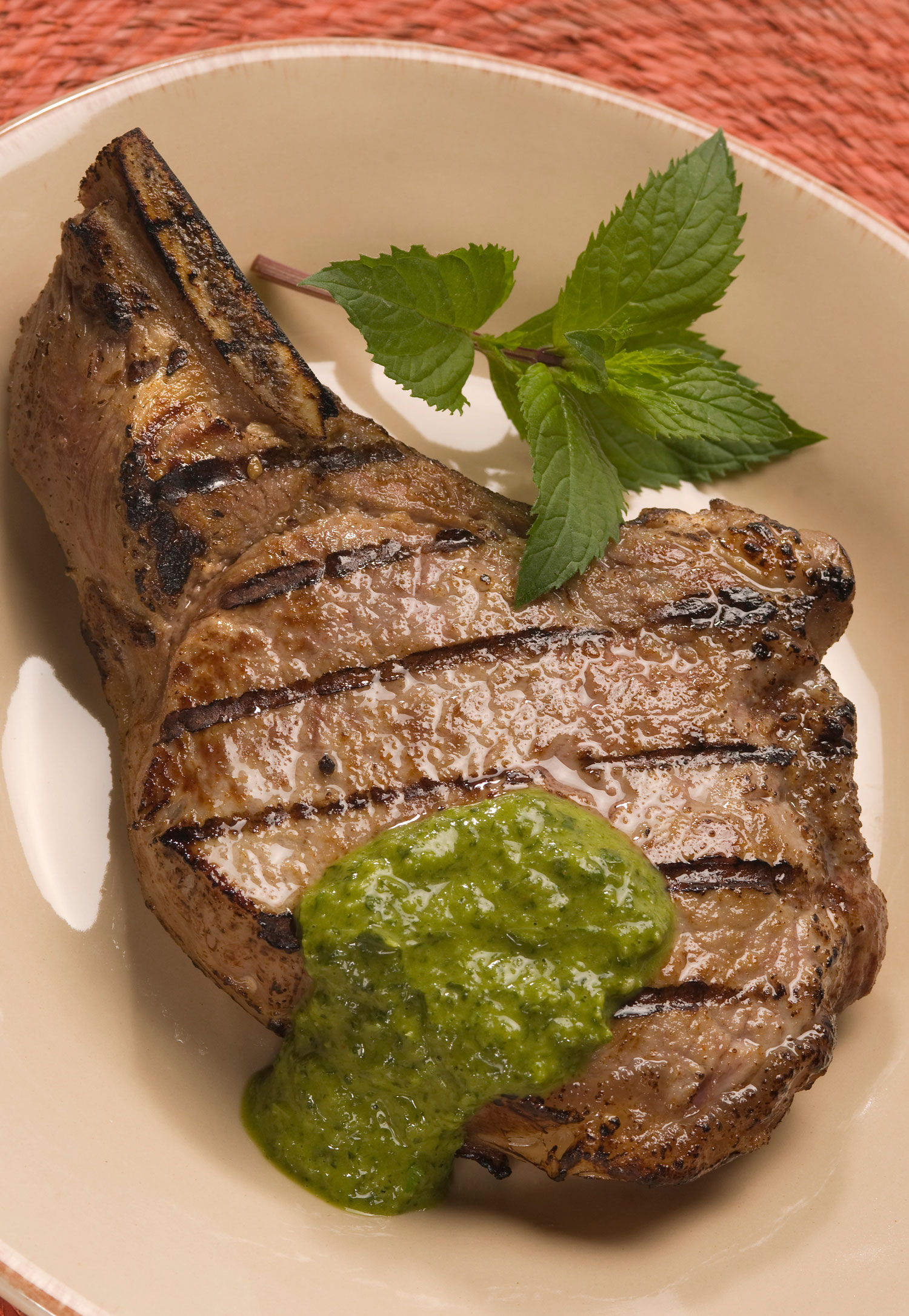 Grilled Veal Chops with Cilantro-Mint Chimichurri background image