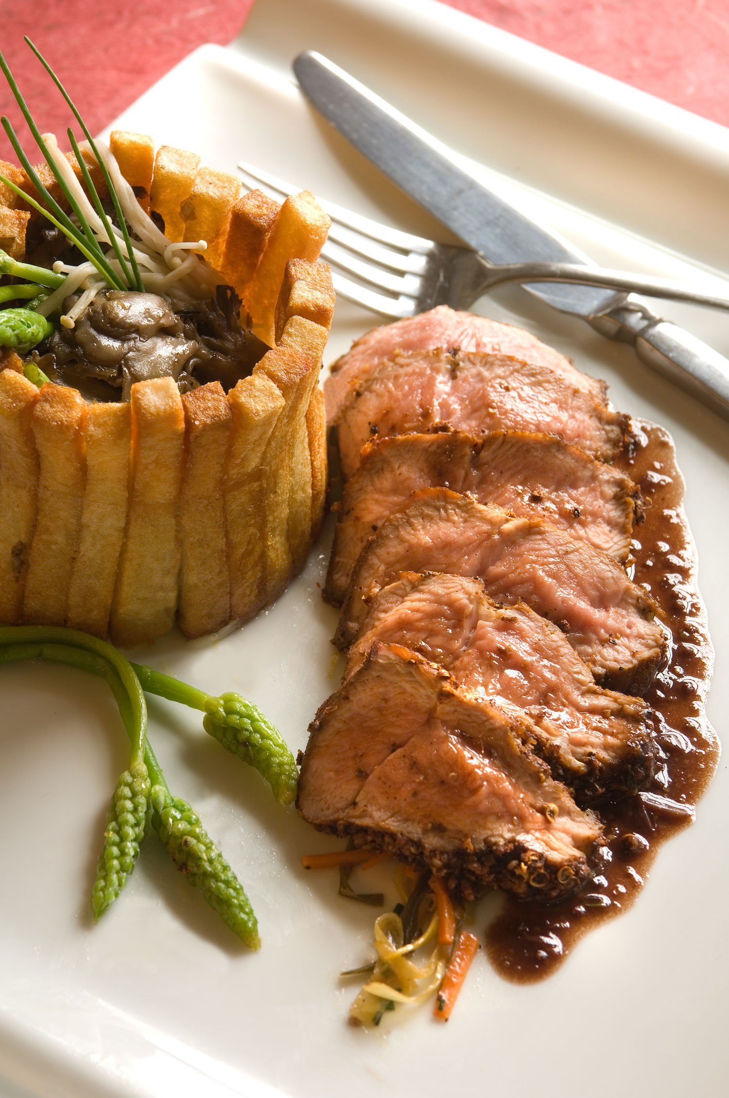 Pastrami Flat Iron Steaks with Fancy Fries and Warm Maitake and Asparagus Salad background image