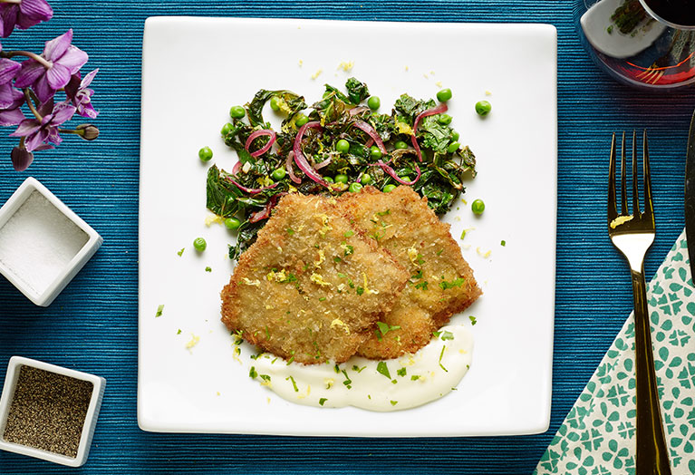 Veal Cutlets with a pea salad and a cream sauce