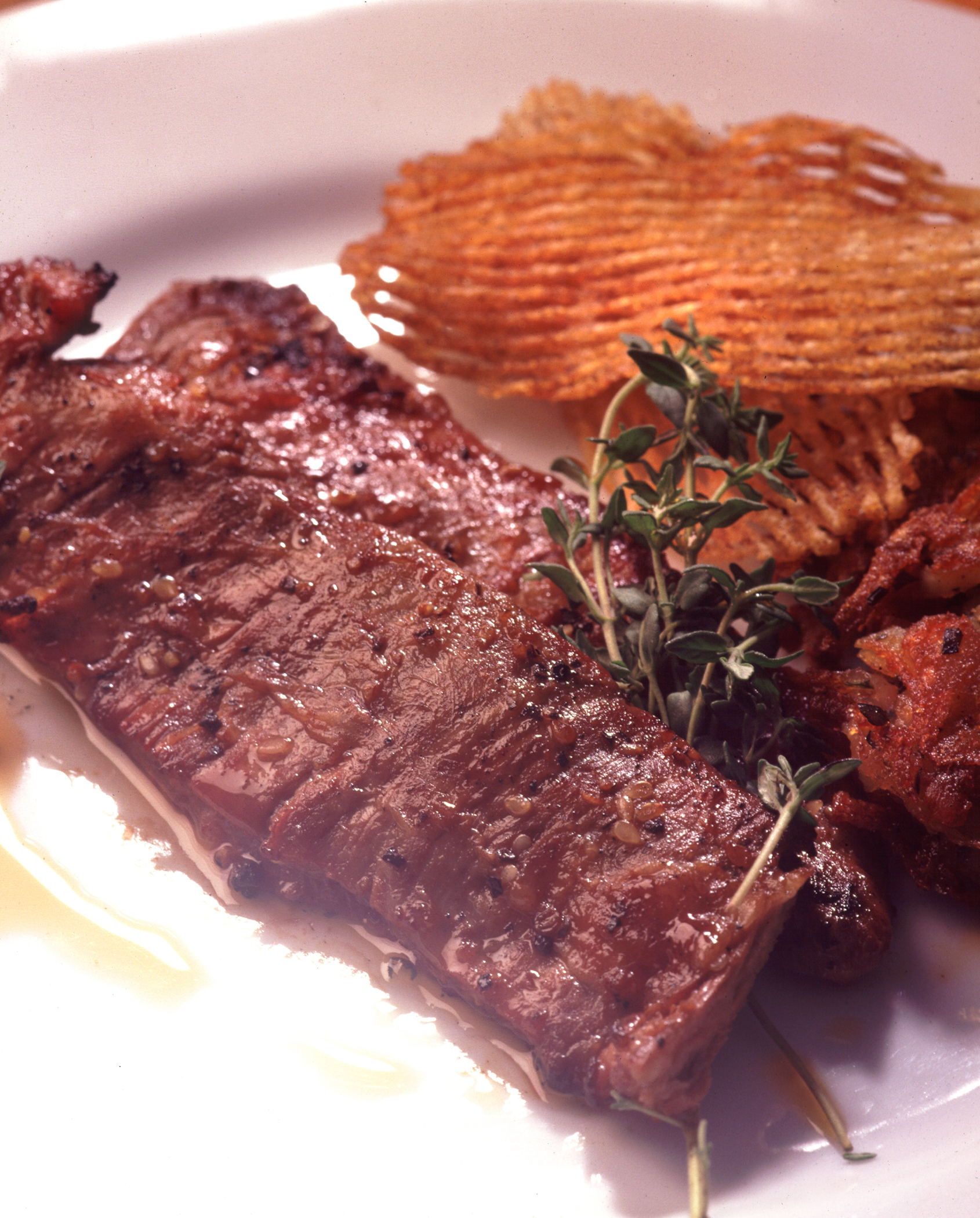 Veal Skirt Steaks with Asian Spices and Lobster Hash Cakes background image