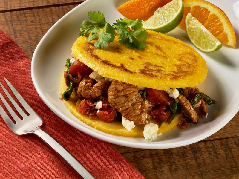 Veal Spinach and Tomato Arepas background image