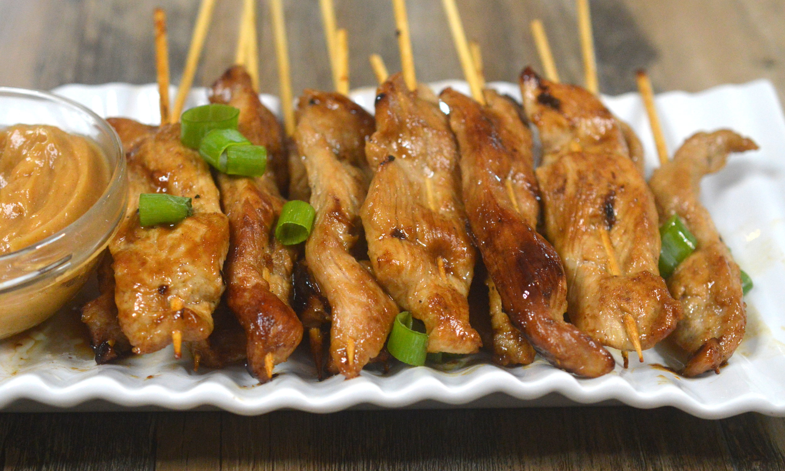 Veal skewers with a peanut dipping sauce