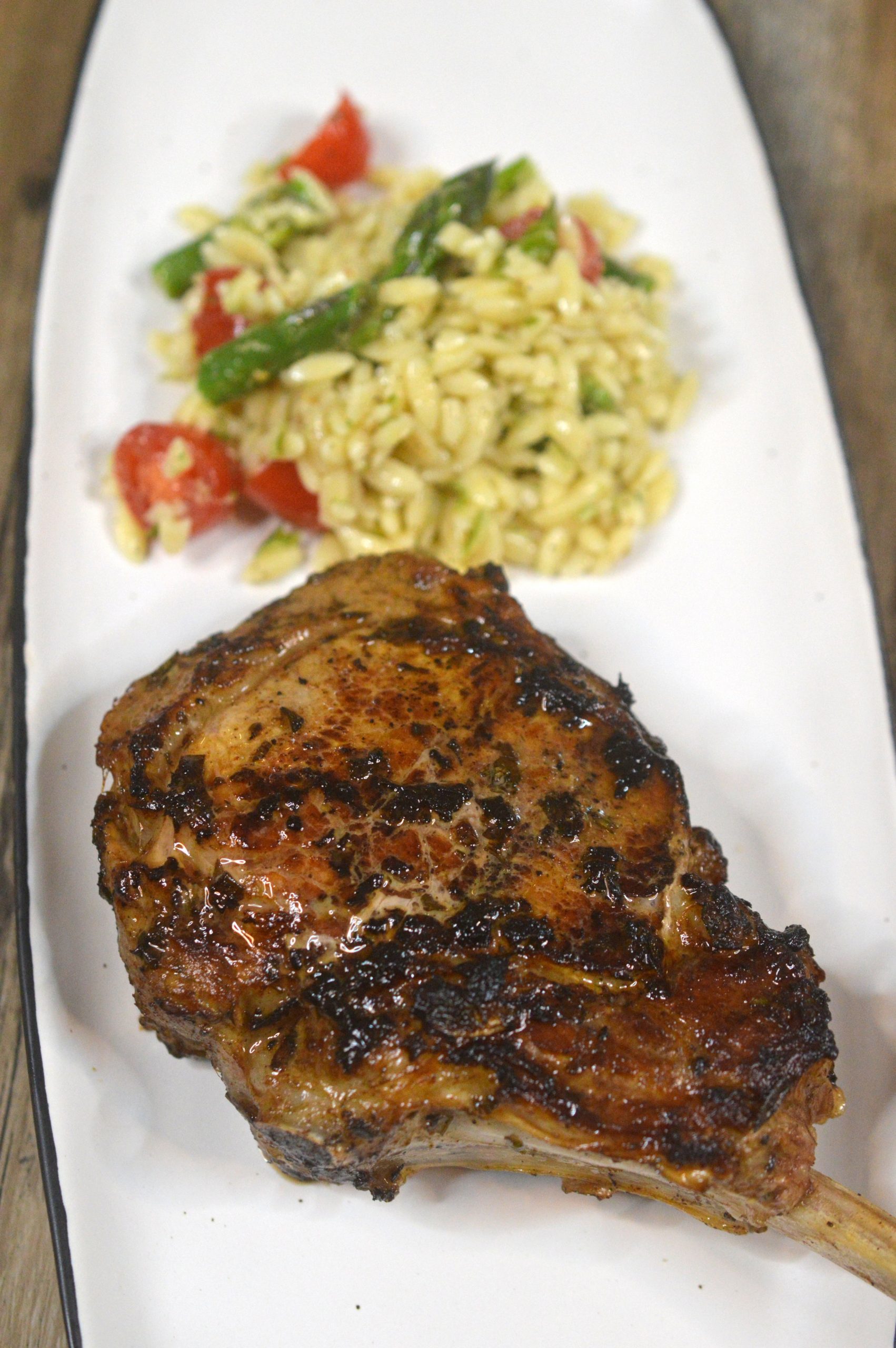 Grilled veal chops with a rice pilaf side