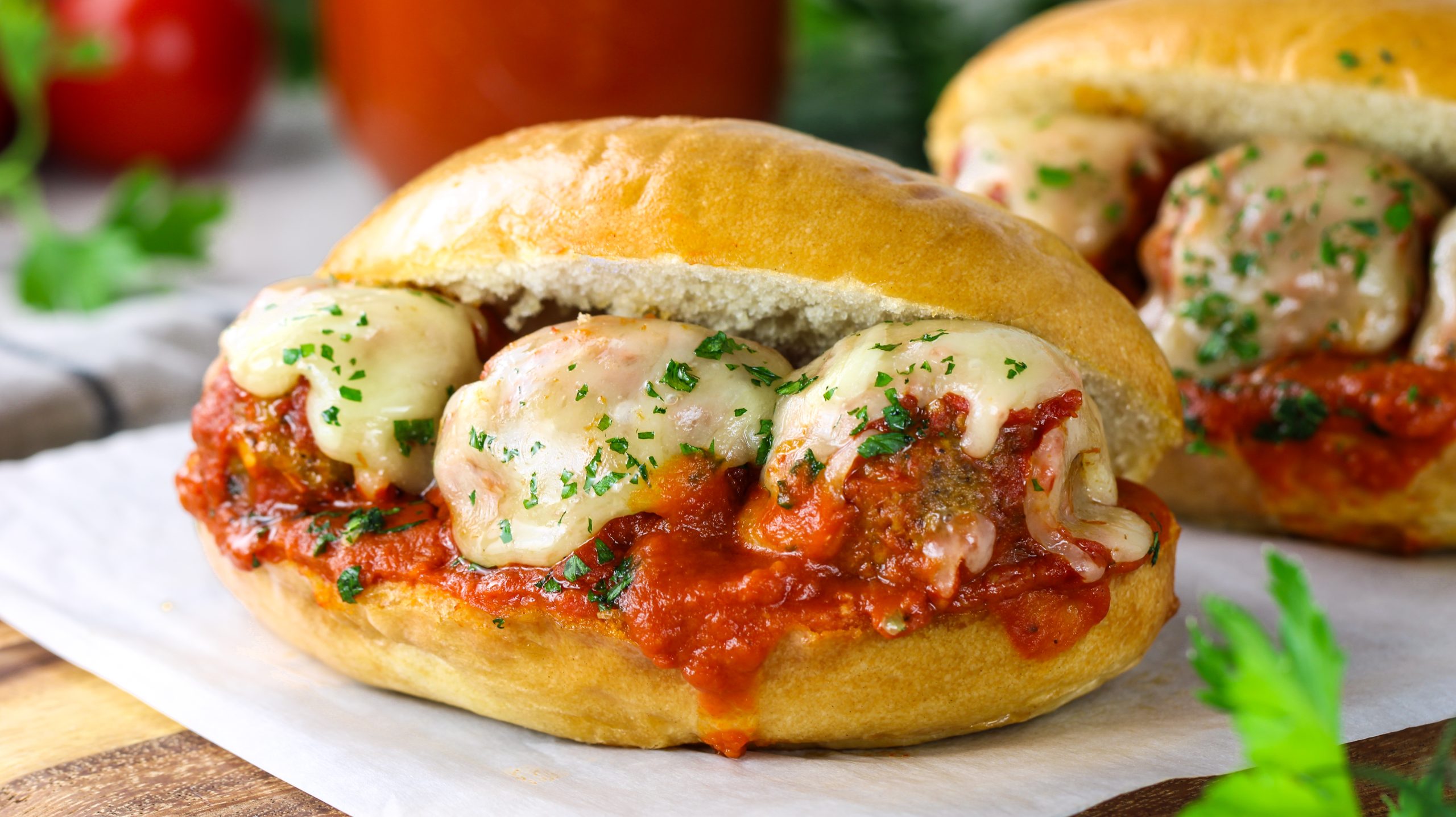 Classic Meatball handlheld sub with melty cheese and red sauce
